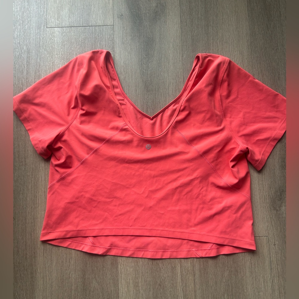 Lululemon coral cropped top, approximately size 18